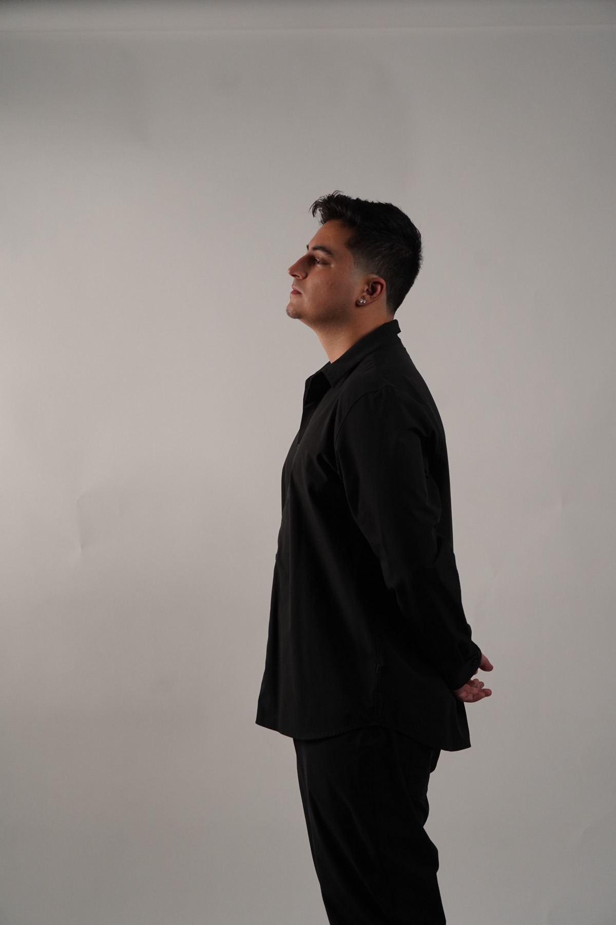 DJ OTEO — side profile studio portrait